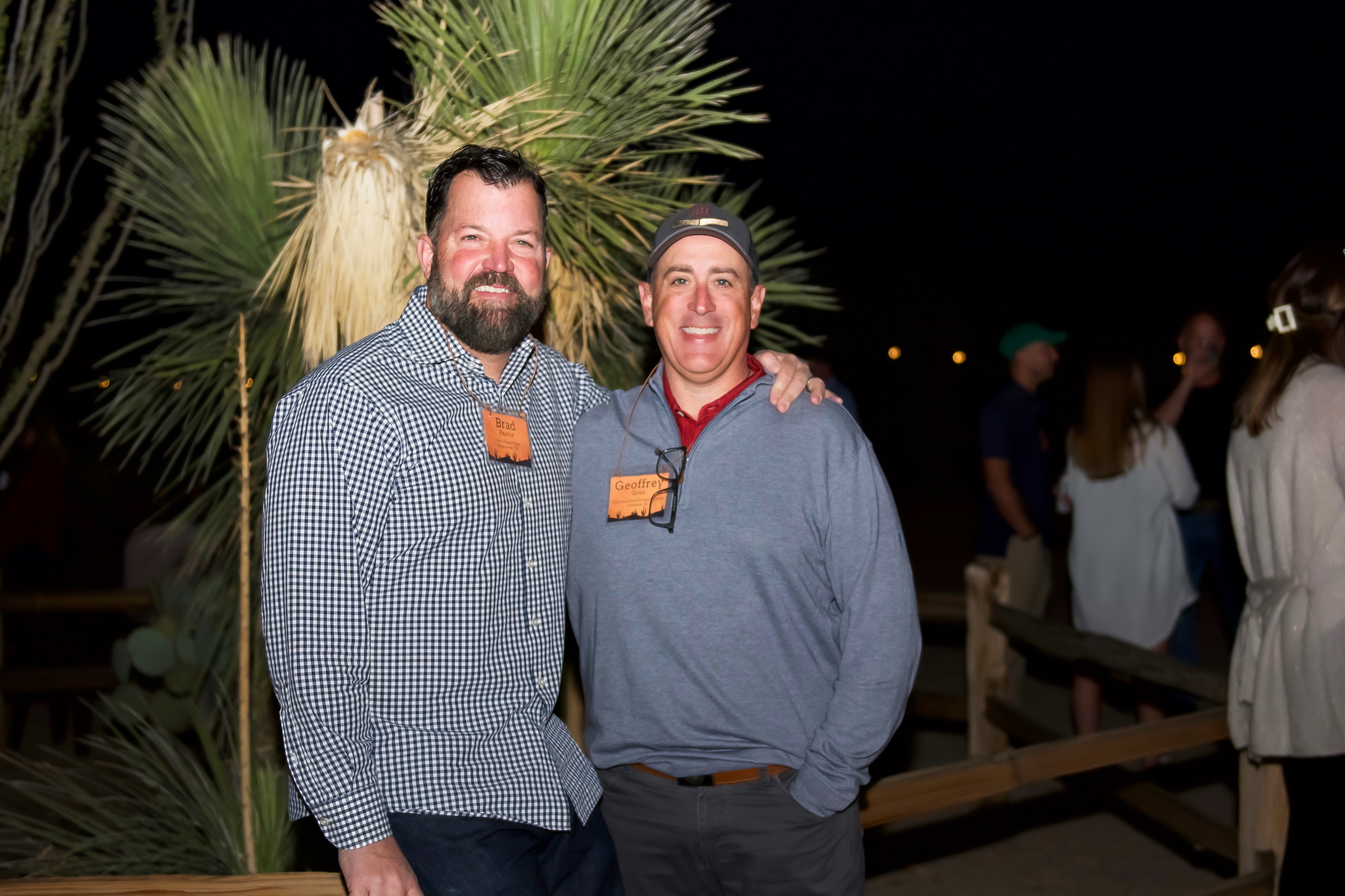 Brad Pearce and Geoffrey Gran are all smiles at the cowboy cookout.