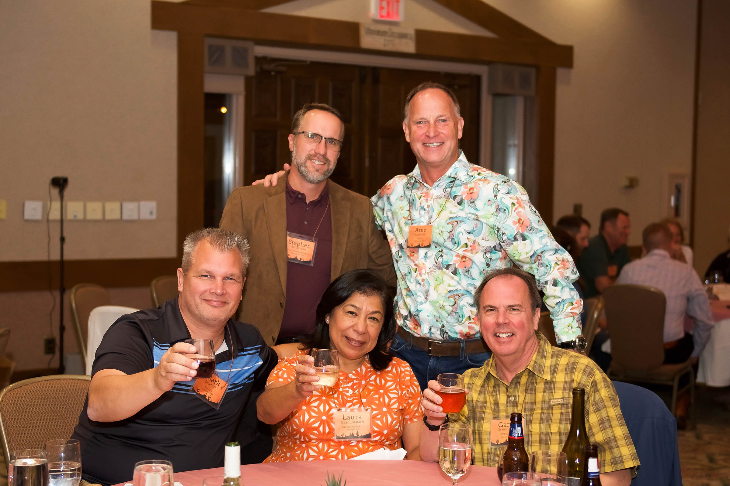 Conference attendees Nick Ciepluch, The Grandlienards, Arne Anderson and Stephen Johnstone toast to the winners at the ISFA Awards dinner.