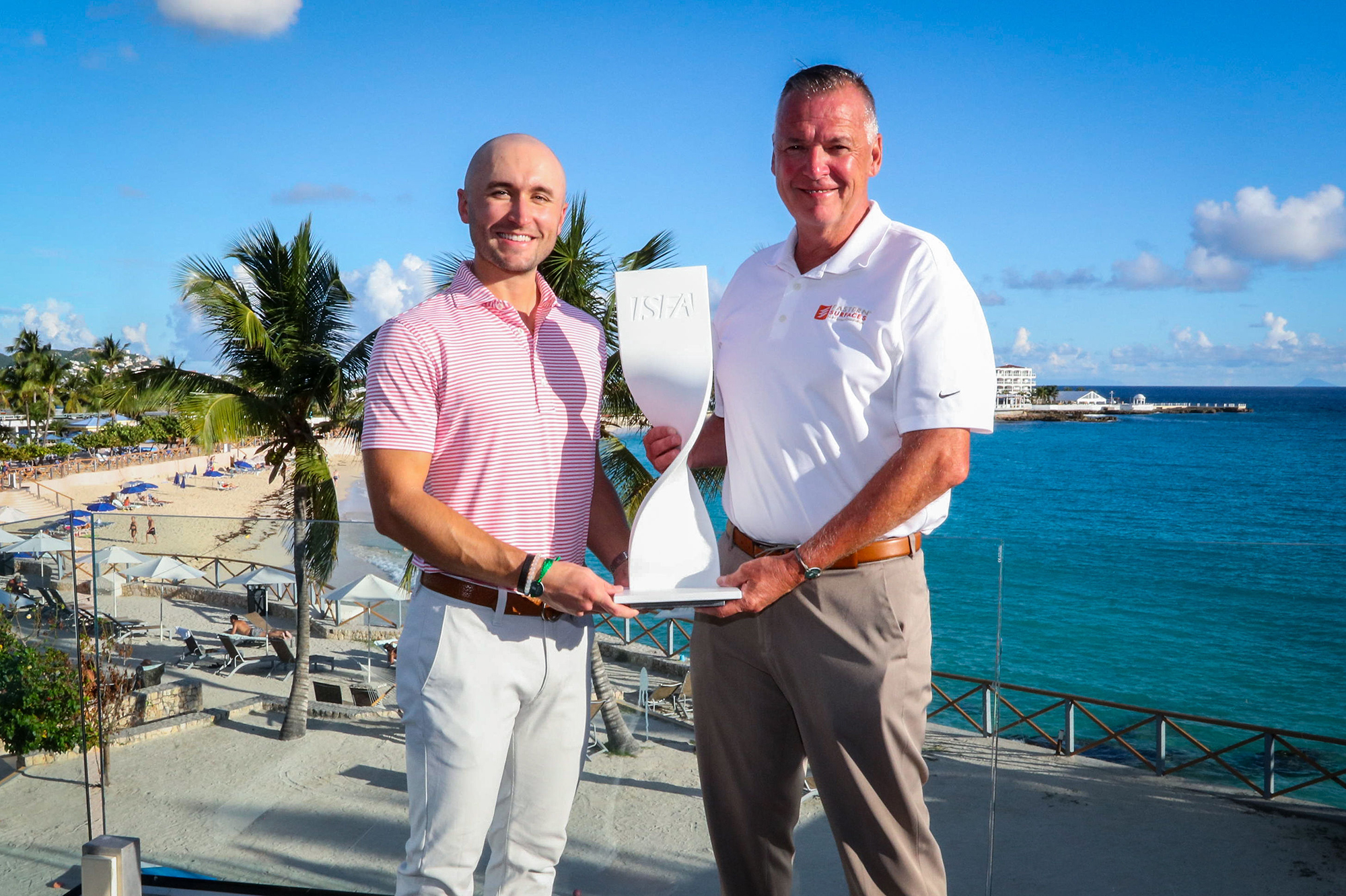 2023 ISFA President Austin Maxwell presents Brian Rocca, owner of Eastern Surfaces, with the 2023 Fabricator of the Year Award. Through the years, Eastern Surfaces has embodied the core principles of ISFA: an adherence to strict standards of excellence, the pursuit of cutting-edge technology, and a commitment to ongoing innovation. 