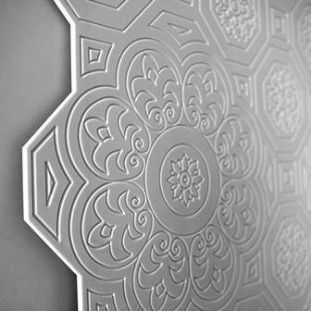 Figure 3 – Installing panels with such intricate and exact patterning without damaging the engraving was a bit of a challenge. CREA Diffusion overcame that by cutting the panels into sections with “puzzle-shaped” edges.